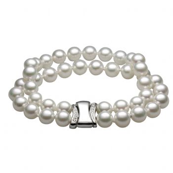 akoya pearls 8-8,5 mm, diamond closing0,01 ct - 6 x; 0,02 ct - 2 x